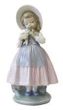 Lladro Nao Girl Admiring Flowers