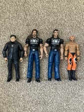 Mattel WCW Figure Bundle WWE Job Lot 4 Figures NWO, Eric Bischoff, Rey Mysterio
