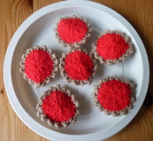 Hand knitted strawberry - hand,