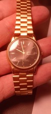 citizen cq day date watch black dial gold tone