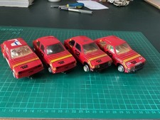 Scalextric 4 X Red Ford Escort XR3i cars Spares or Repair
