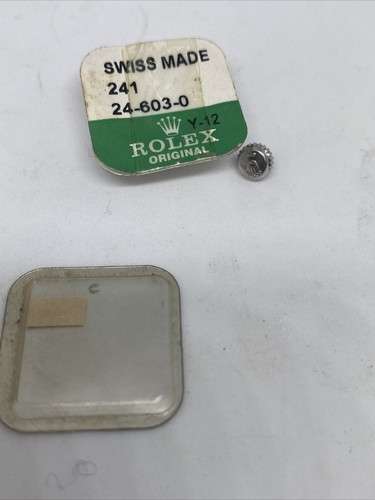 Rolex watch winder and circlip - and,