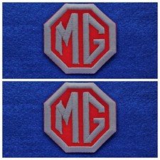 A Pair Of Motor Car Racing