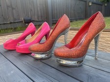 x2 pairs of stunning ladies stilettos shoes. Orange & pink pair, size 6.