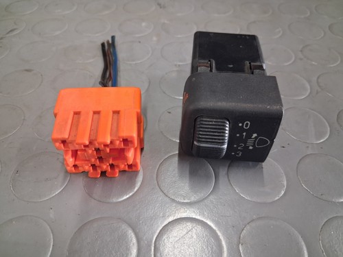 Headlight adjustment button