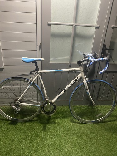 Raleigh white and blue - blue, road