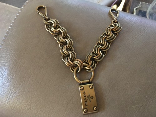 Prada brass bag charm used - prada,