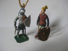 Lasset knight with a winged helmet and saxon warrior.