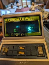 Tomy caveman electronic game - tomy,