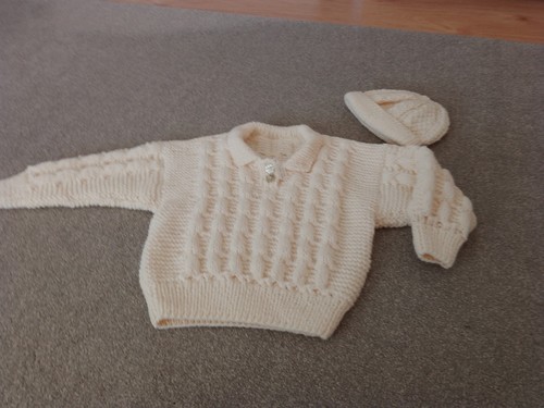 Hand knitted aran boy - hand,
