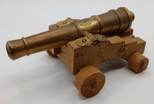Vintage Brass Cannon Ornament on Wooden Base Wooden Wheels As Seen 