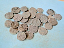Five Encrusted Roman Bronze Coins for Cleaning and Identification.