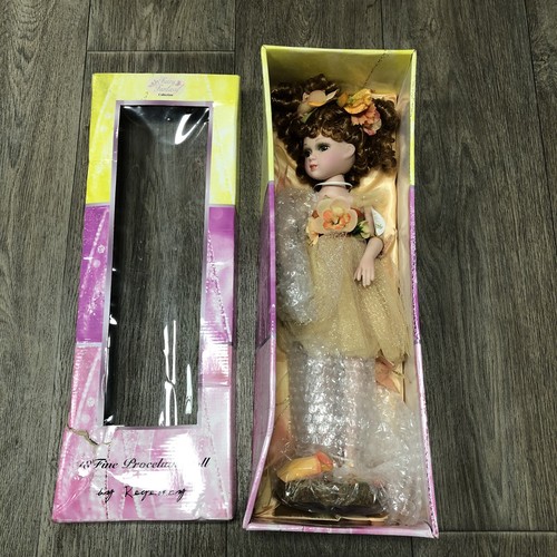 Fine porcelain doll by - fine,