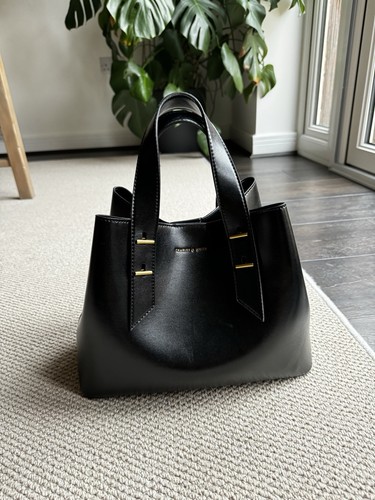 Black charles and keith faux - and,