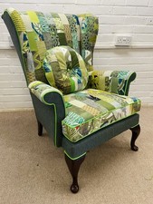 Parker Knoll Style Wingback Chair Upholstered In Green Colours Patchwork Design