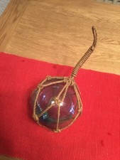 Vintage hand blown Aqua Blue Glass Ball Fishing Float Buoy globe in hanging net.