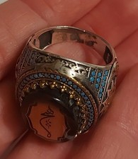 Turkish-style men's ring with turquoise and central stone with Arabic engraving