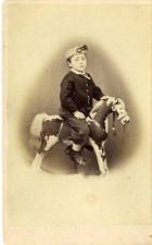 Young boy on painted rocking horse cdv photo