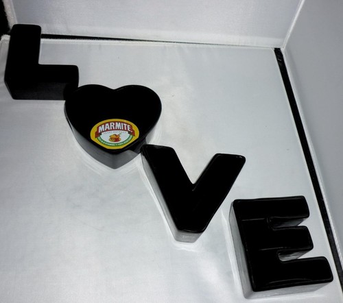 Unusual black ceramic - black, love