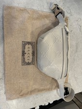 Gucci GG embossed belt bag