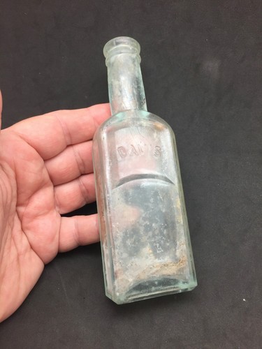 Empty antique bottle davis - empty,
