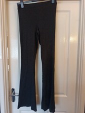 Primark Ladies Black Rubber Trousers. Size Medium Flared 