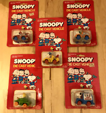 Five Snoopy Die Cast Vehicles, fire tow ice cream tank in blister packs Peanuts