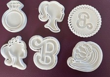 Assorted sand moulds with