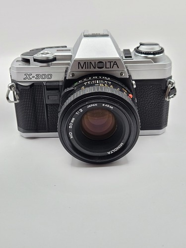 Minolta 300 35mm camera - x-300,