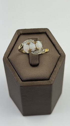 Opal and diamond 9ct gold - and, ring
