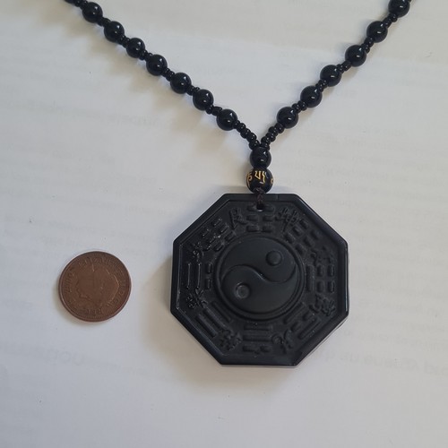 Black beaded ball - ,