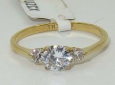 Ladies gold ring three stone