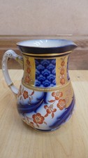 MACINTYRE MOORCROFT Jug  in flow blue and gilded Backstamp REG for 1897
