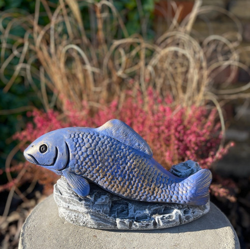 Concrete koi fish statue