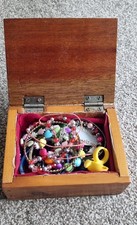 Wooden lined jewellery box full of jewelleryTreasure chest!