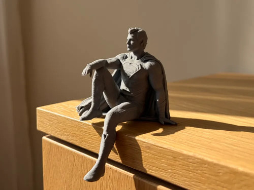 Man steel sitting ledge - of, on
