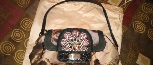 Prada clutch skipper bag