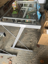 Two glass computer desks one