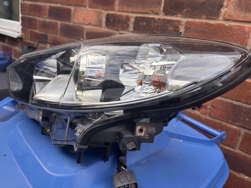 Mazda front headlight left - front,