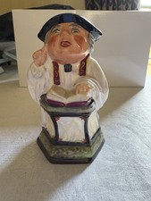 A Miniature Toby Jug Figure Of