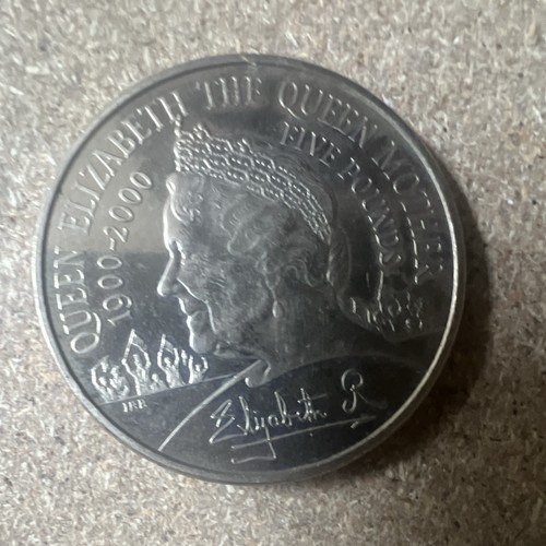 Five pounds coin - five,