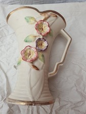 Decorative Arthur Wood Jug With Flower Decoration.