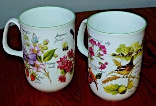 Two china mugs rose - two, of