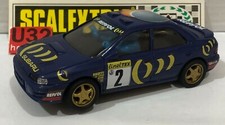 Scalextric Tyco 8377 Subaru Impreza #2 C. Sainz - L. Moya With Light