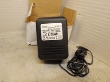 An OEM ICOM rapid charger BO-145UK. OUTPUT 16 VOLTS @ 1000ma. UK  plug. New/O