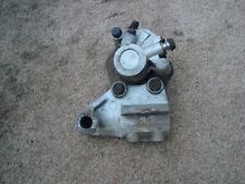 2001 KAWASAKI KMX125 KMX 125 MOTORBIKE REAR BRAKE CALIPER AND CARRIER BRACKET