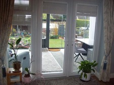 Integrated venetian door