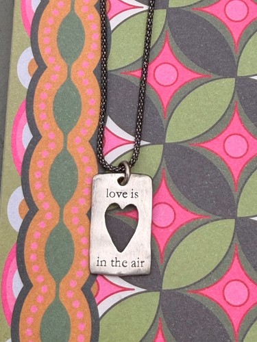 Bjorg heart cutout pendant - cutout,