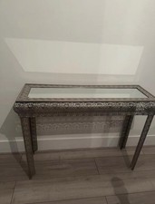 metal embossed console table
