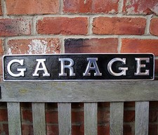 Garage sign cast - cast,